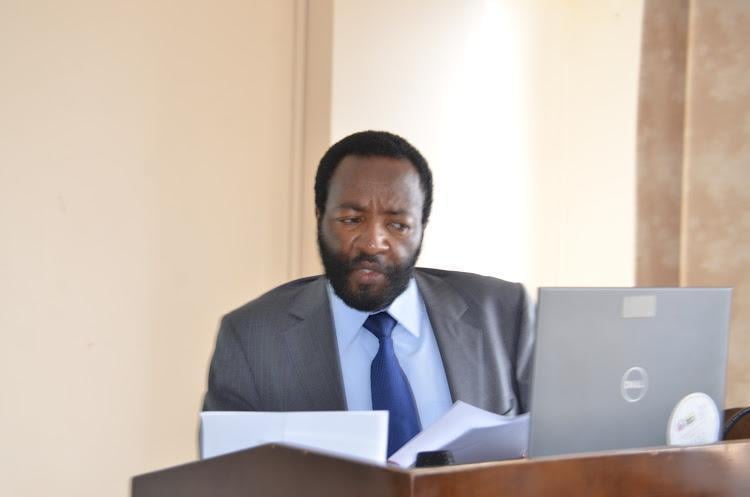 File image of Kenya Met Department director David Gikungu.